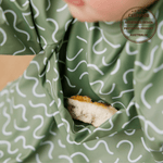 Pistachio Puff waterproof long sleeve smock bib by Abibi, full wrist-to-collar coverage for baby-led weaning and starting solids