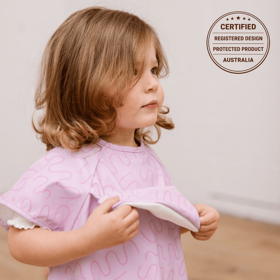 Lilac Lollipop waterproof short sleeve smock bib by Abibi, full coverage for messy mealtimes and starting solids