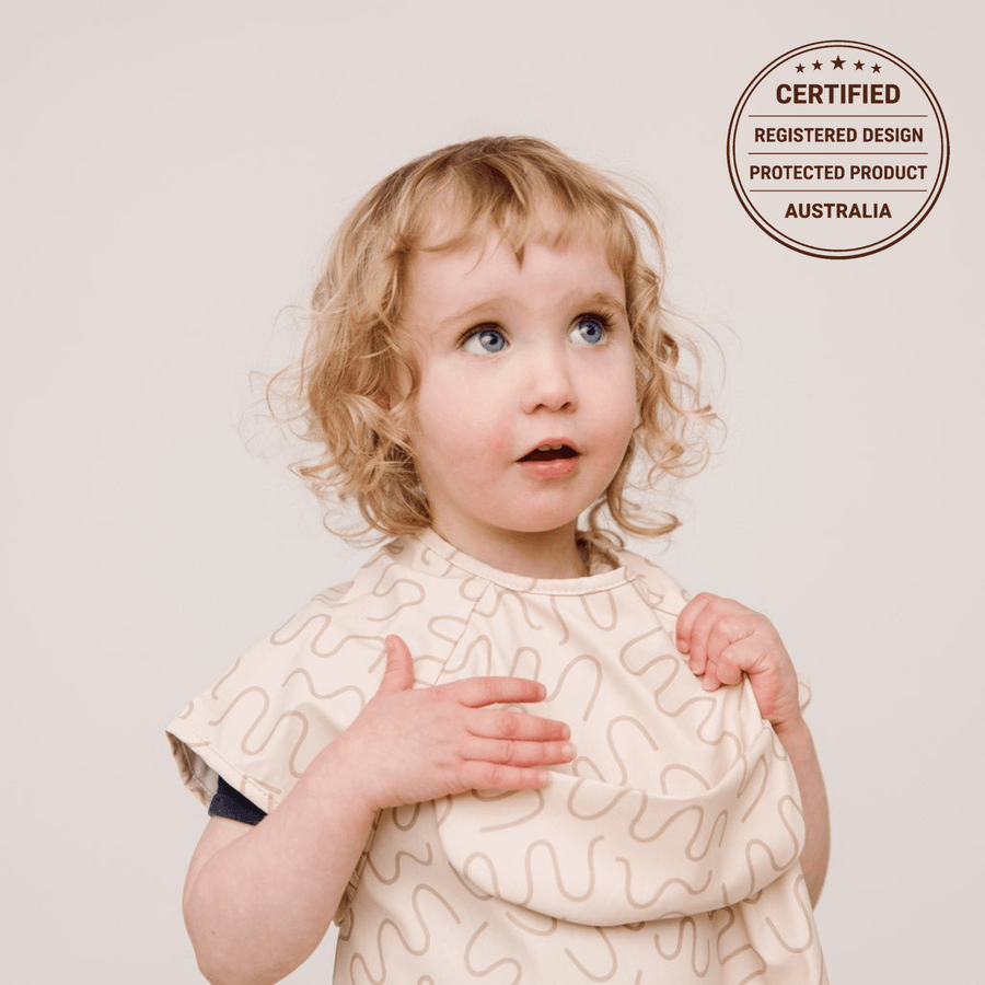 Biscuit Bite waterproof short sleeve smock bib by Abibi, full coverage for messy mealtimes and starting solids
