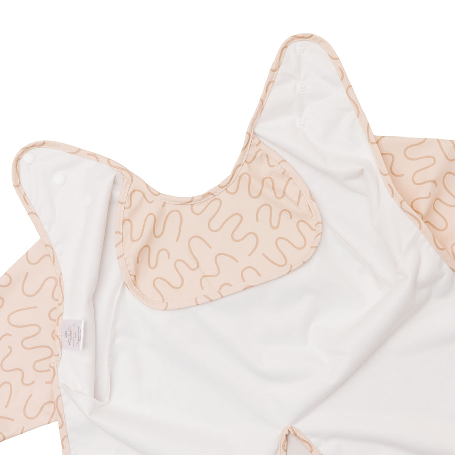 Biscuit Bite beige waterproof short sleeve baby feeding smock by Abibi - mess proof inner collar flap