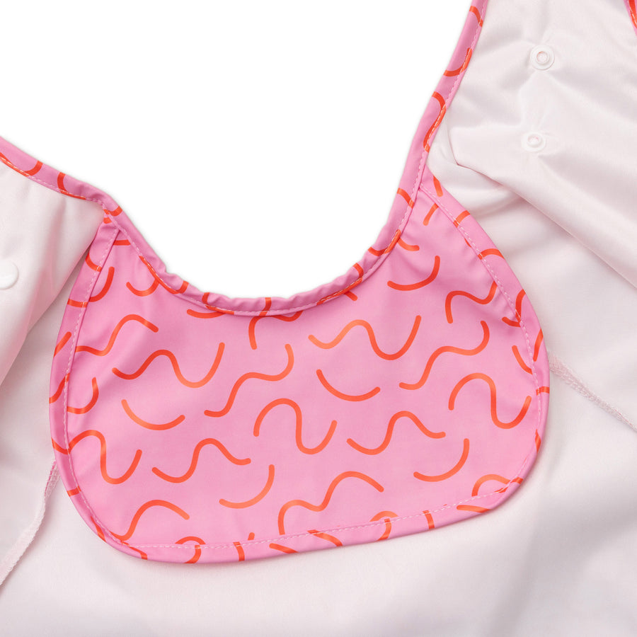 Strawberry Smudge pink waterproof short sleeve baby feeding smock by Abibi - mess proof inner collar flap