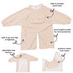 Biscuit Bite waterproof long sleeve smock bib by Abibi, full wrist-to-collar coverage for baby-led weaning and starting solids