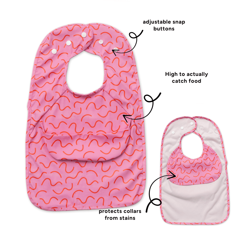 Strawberry Smudge Less Mess waterproof baby bib by Abibi, full front coverage that wipes clean for starting solids