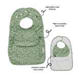 Pistachio Puff Less Mess waterproof baby bib by Abibi, full front coverage that wipes clean for starting solids