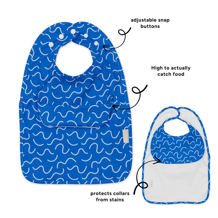 Blueberry Burst Less Mess waterproof baby bib by Abibi, full front coverage that wipes clean for starting solids