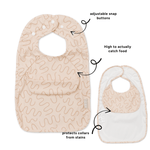 Biscuit Bite Less Mess waterproof baby bib by Abibi, full front coverage that wipes clean for starting solids