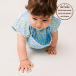 Sky Snack waterproof short sleeve smock bib by Abibi, full coverage for messy mealtimes and starting solids