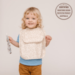 Biscuit Bite Less Mess waterproof baby bib by Abibi, full front coverage that wipes clean for starting solids