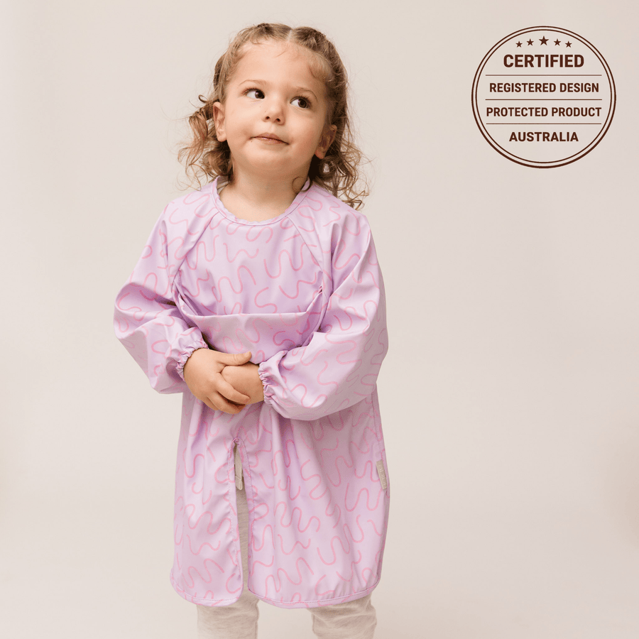 Lilac Lollipop waterproof long sleeve smock bib by Abibi, full wrist-to-collar coverage for baby-led weaning and starting solids