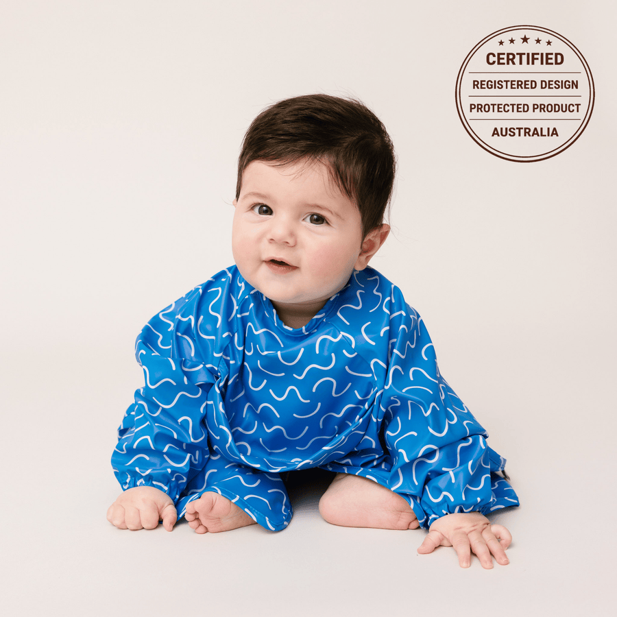 Blueberry Burst waterproof long sleeve smock bib by Abibi, full wrist-to-collar coverage for baby-led weaning and starting solids