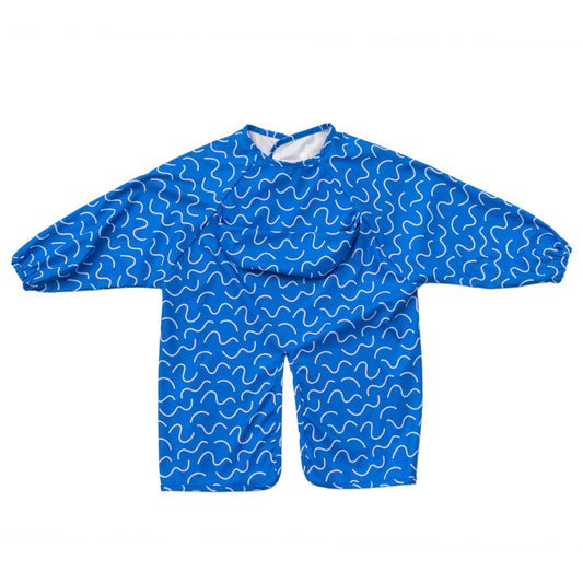 Abibi long sleeve smock bib, bright playful print, keeps clothes clean during mealtimes