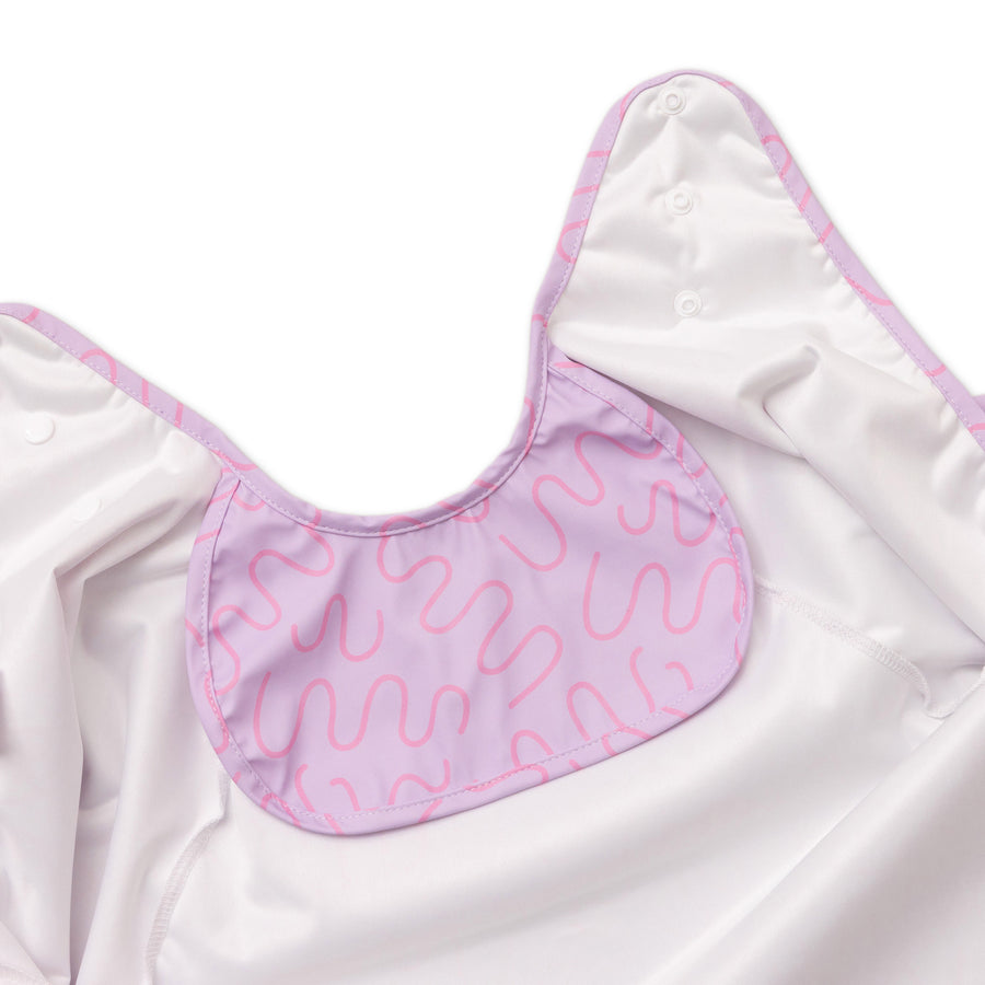 Lilac Lollipop purple waterproof short sleeve baby feeding smock by Abibi - mess proof inner collar flap