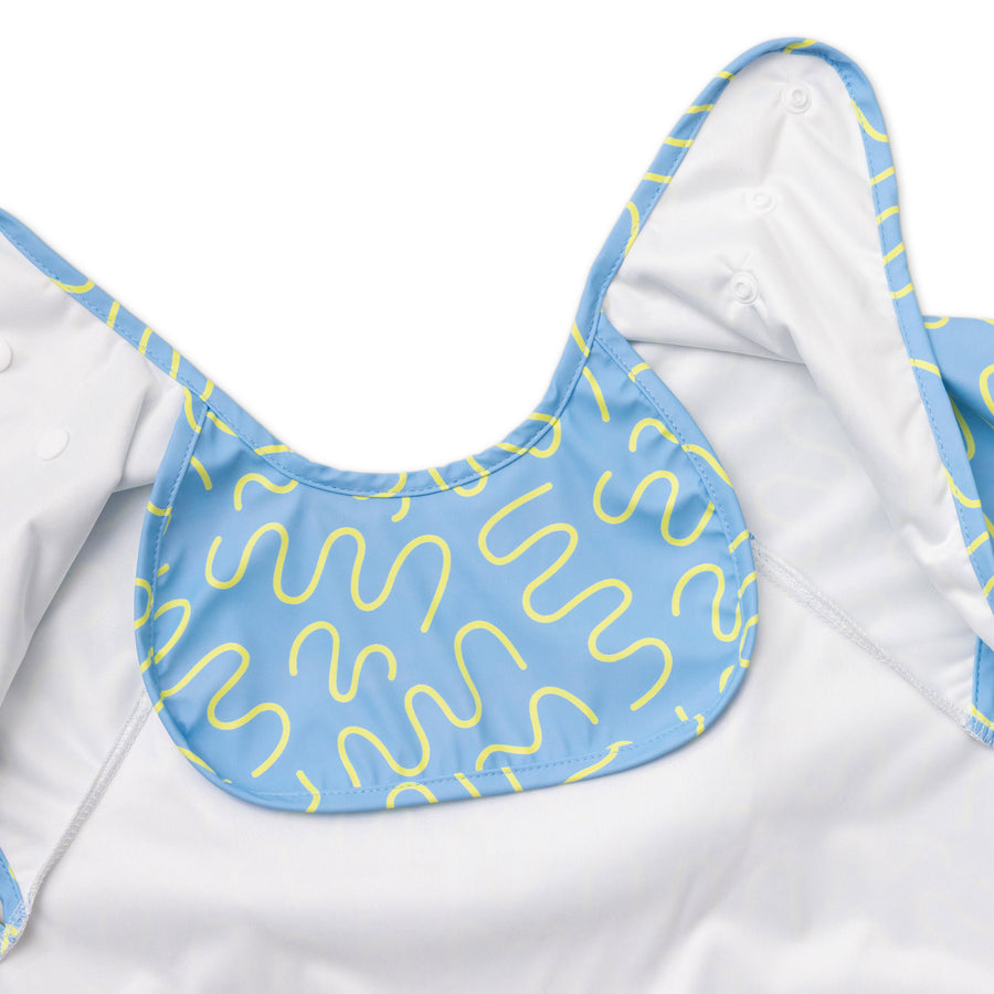 Sky Snack blue waterproof short sleeve baby feeding smock by Abibi - mess proof inner collar flap