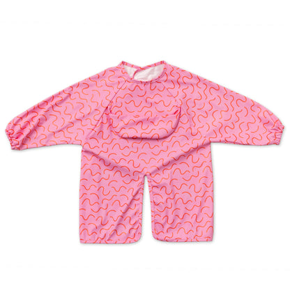 Abibi long sleeve smock bib, bright playful print, keeps clothes clean during mealtimes